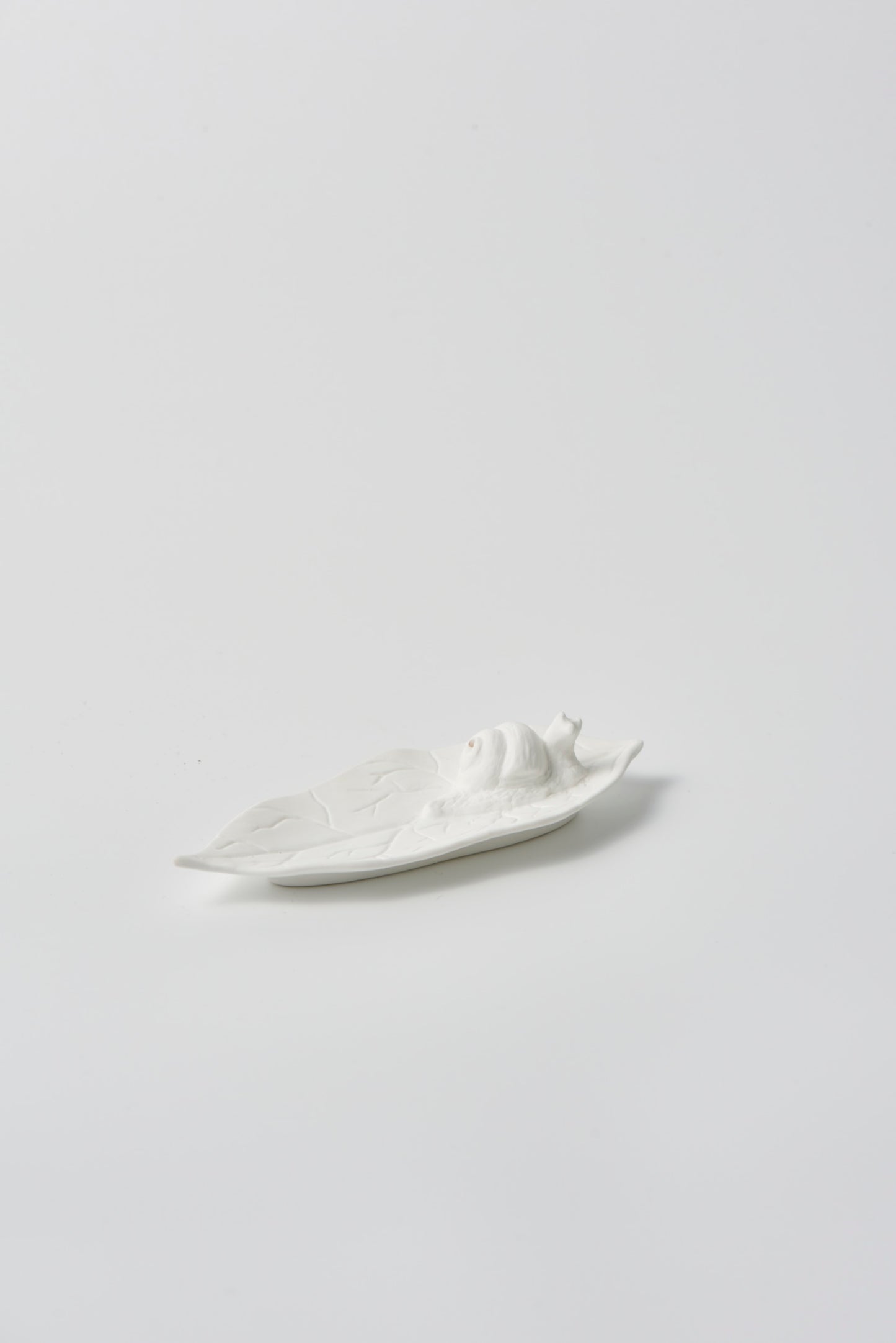 Snail incense holder